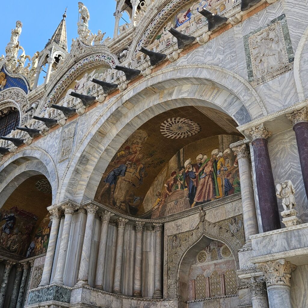 Front of the church in Venice,all differents colors of the marble.