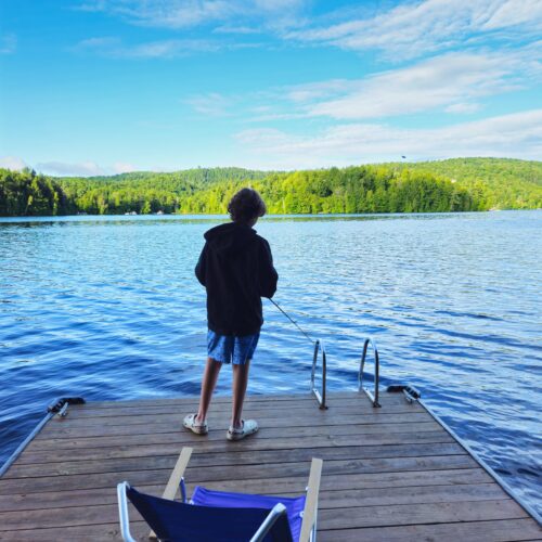 kid fishing at the lake